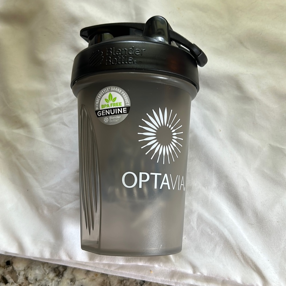 Optivia blender bottle, 20 ounce. Brand new.